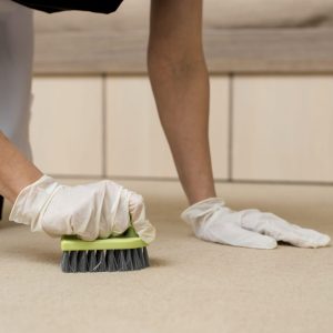 chambermaid-preparing-hotel-room-min